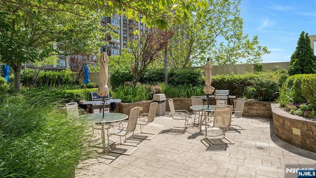 1600 Parker Ave Unit 1G, Fort Lee, NJ 07024 - view of patio / terrace featuring outdoor dining space and exterior kitchen