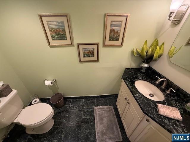900 Palisade Unit 1-J, Fort Lee, NJ 07024 - bathroom with vanity and toilet
