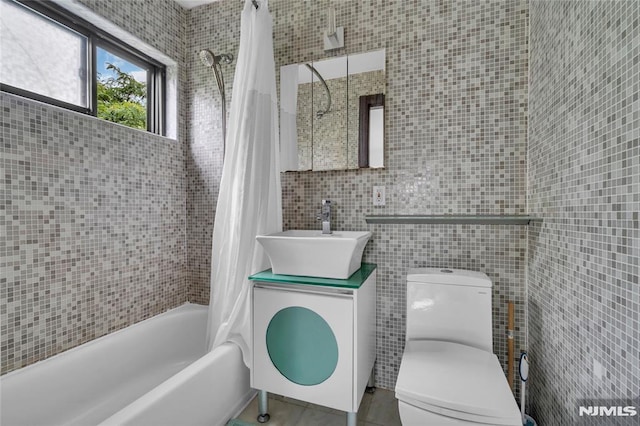 500 Linwood Dr Unit 5H, Fort Lee, NJ 07024 - full bathroom with tile walls, shower / bath combination with curtain, vanity, and tile patterned floors