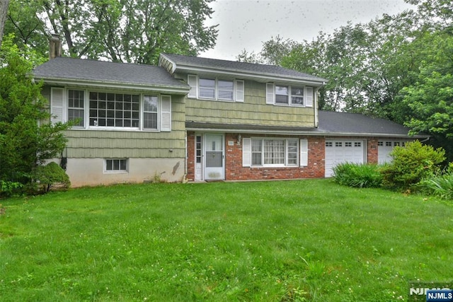 50 Grove St, Waldwick, NJ 07463 - tri-level home featuring an attached garage and a front yard