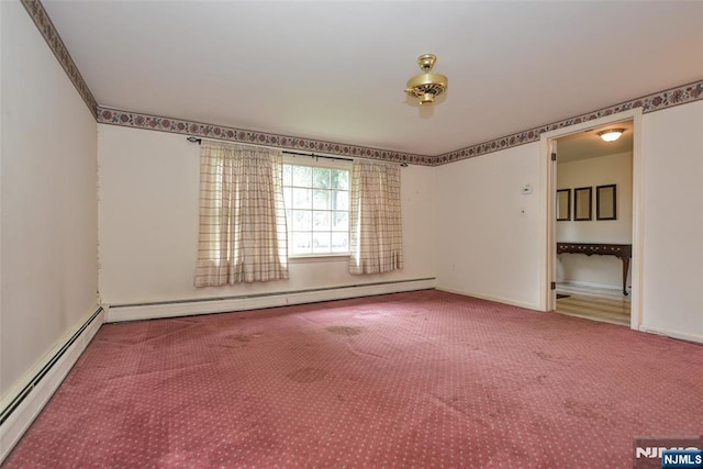 50 Grove St, Waldwick, NJ 07463 - empty room with a baseboard radiator and carpet