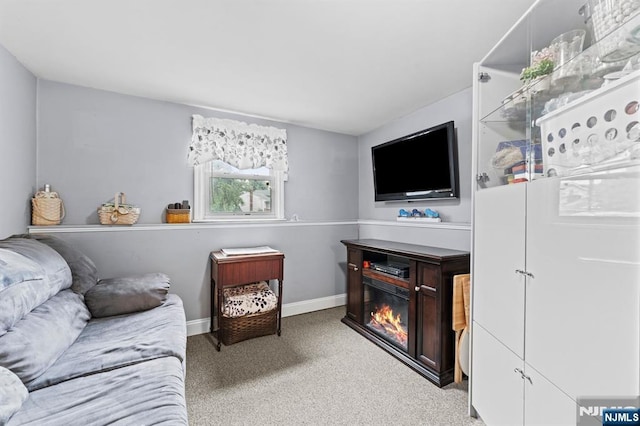 37 Furber Ave, Linden, NJ 07036 - carpeted living room featuring baseboards and a glass covered fireplace