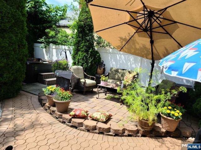 37 Furber Ave, Linden, NJ 07036 - view of patio / terrace with a jacuzzi and an outdoor living space