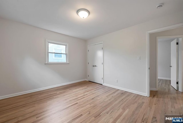 97 Palisade Ave, Leonia, NJ 07605 - spare room featuring light wood-type flooring and a smoke detector