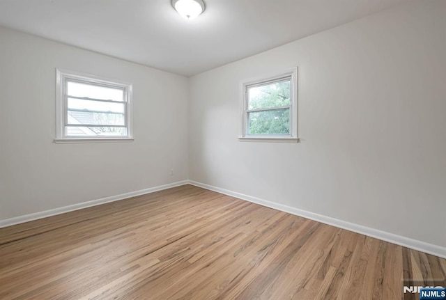 97 Palisade Ave, Leonia, NJ 07605 - empty room featuring light wood-style flooring and baseboards