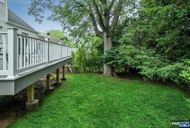 97 Palisade Ave, Leonia, NJ 07605 - view of grassy yard with a wooden deck