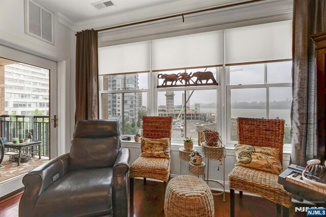 20 Ave At Port Imperial 425, West New York, NJ 07093 - sitting room featuring wood finished floors, plenty of natural light, and ornamental molding