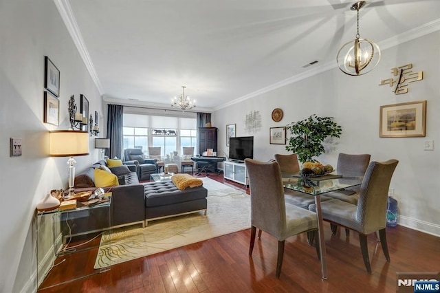 20 Ave At Port Imperial 425, West New York, NJ 07093 - dining area with a chandelier, hardwood / wood-style flooring, and crown molding