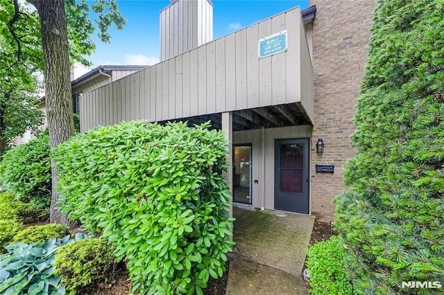 2171 Ellery Ave Unit A, Fort Lee, NJ 07024 - property entrance with brick siding and a chimney