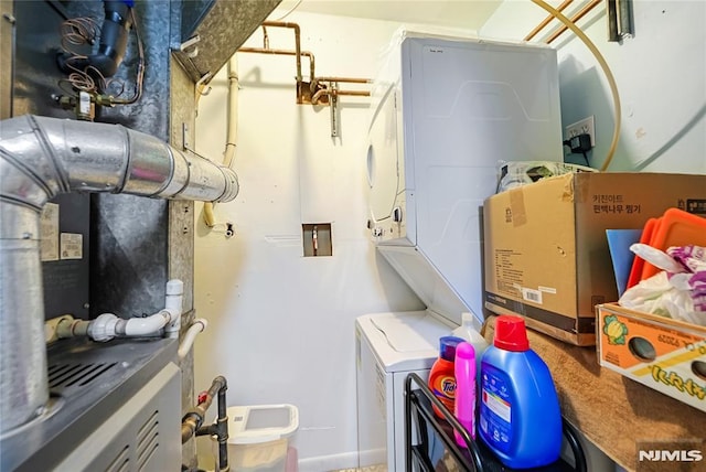 2171 Ellery Ave Unit A, Fort Lee, NJ 07024 - laundry area with stacked washing machine and dryer