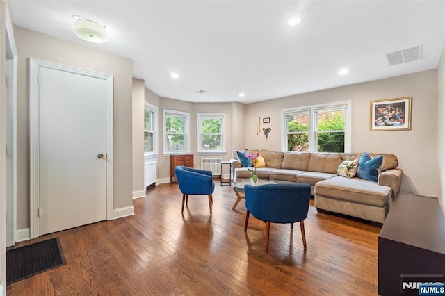 37 Golf Ct, Teaneck, NJ 07666 - living area with radiator, wood finished floors, and recessed lighting