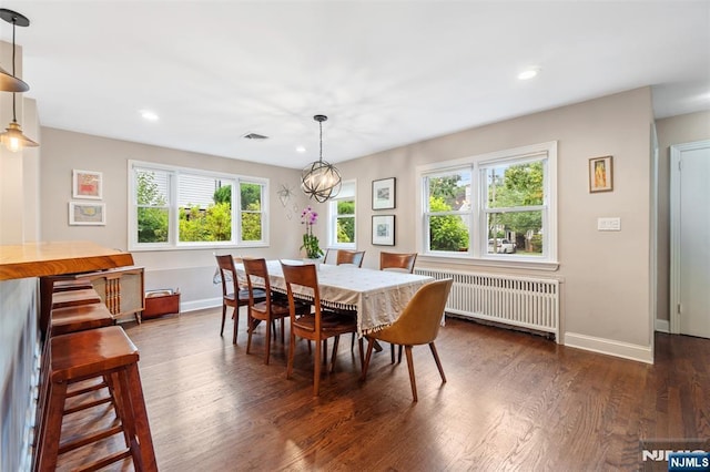 37 Golf Ct, Teaneck, NJ 07666 - dining area featuring radiator, recessed lighting, dark wood-style flooring, and a chandelier