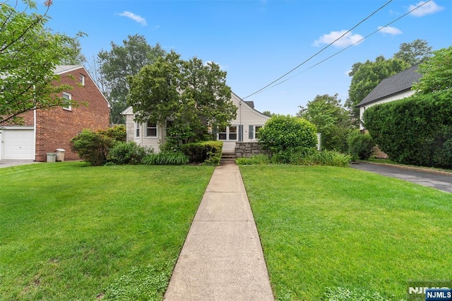 37 Golf Ct, Teaneck, NJ 07666 - obstructed view of property with a front yard