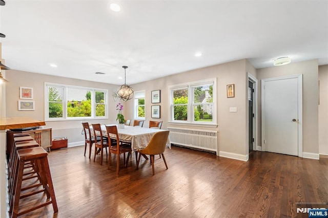 37 Golf Ct, Teaneck, NJ 07666 - dining room featuring radiator heating unit, dark wood-style floors, and recessed lighting