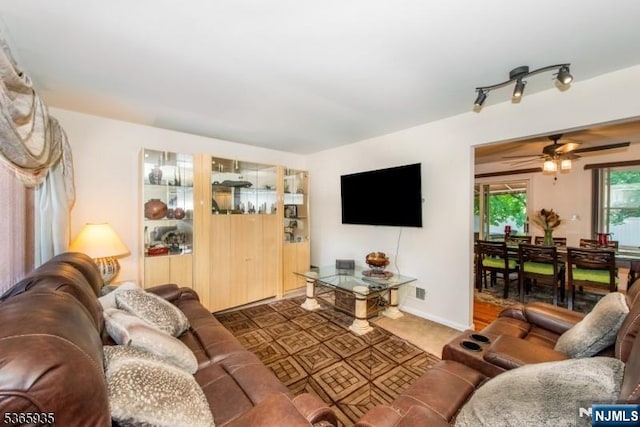 362 Valley Rd, Wayne, NJ 07470 - living area featuring ceiling fan and baseboards