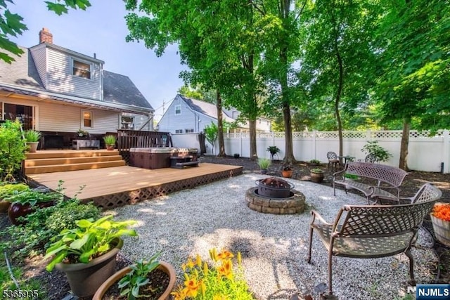 362 Valley Rd, Wayne, NJ 07470 - view of patio featuring an outdoor fire pit, a deck, and a hot tub