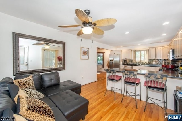 362 Valley Rd, Wayne, NJ 07470 - living room with light wood-style flooring, ceiling fan, and recessed lighting