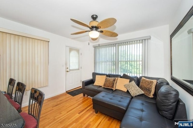 362 Valley Rd, Wayne, NJ 07470 - living area with ceiling fan and light wood-style floors