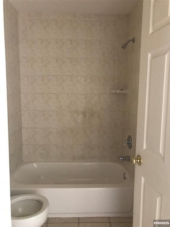 202 Harrison St, Paterson, NJ 07501 - full bathroom with tile patterned floors and bathtub / shower combination