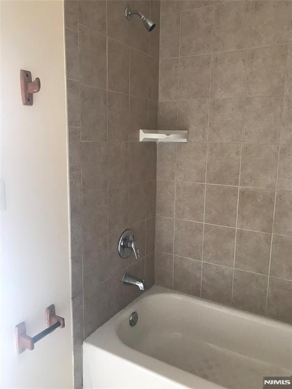 202 Harrison St, Paterson, NJ 07501 - bathroom with tub / shower combination