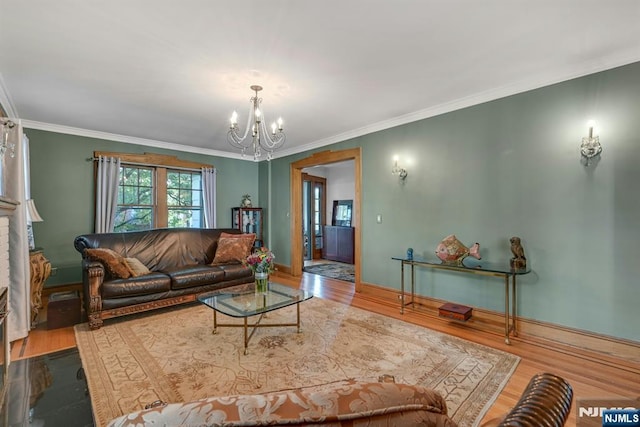 116 Sherman Ave, Teaneck, NJ 07666 - living room with a chandelier, wood finished floors, and ornamental molding