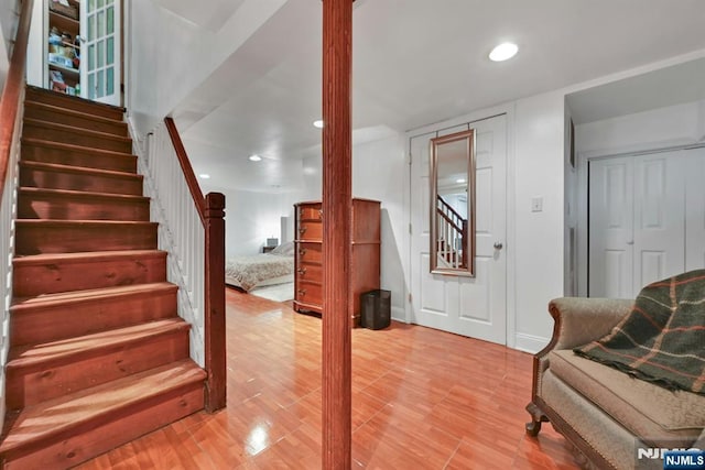 116 Sherman Ave, Teaneck, NJ 07666 - stairway with wood finished floors and recessed lighting