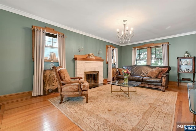 116 Sherman Ave, Teaneck, NJ 07666 - living area with hardwood / wood-style flooring, plenty of natural light, a chandelier, and ornamental molding