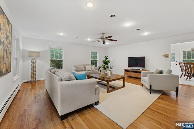 890 Ridgewood Ave, Oradell, NJ 07649 - living area featuring a baseboard heating unit, a ceiling fan, light wood-style flooring, and recessed lighting