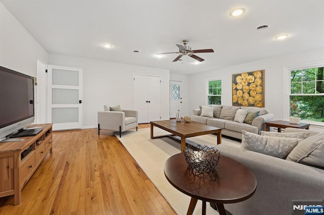 890 Ridgewood Ave, Oradell, NJ 07649 - living area with healthy amount of natural light, light wood-style floors, ceiling fan, and recessed lighting