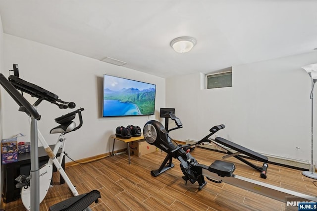890 Ridgewood Ave, Oradell, NJ 07649 - workout area with wood finished floors and baseboards