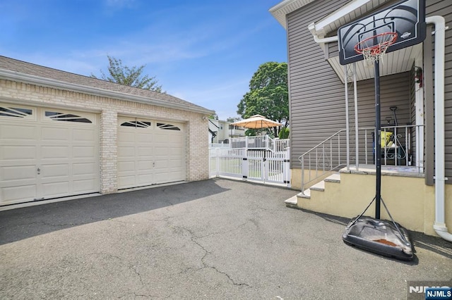 155 8th, Hawthorne, NJ 07506 - garage featuring a gate