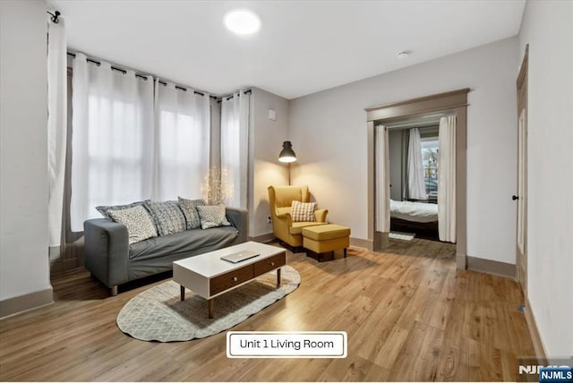 87 James St, Englewood, NJ 07631 - living area with light wood-style flooring