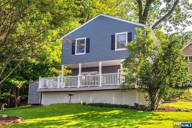 15 Mason St, Jefferson Township, NJ 07849 - rear view of house featuring a deck and a lawn