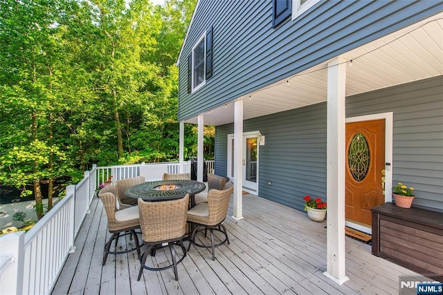 15 Mason St, Jefferson Township, NJ 07849 - wooden terrace with outdoor dining space and an outdoor fire pit