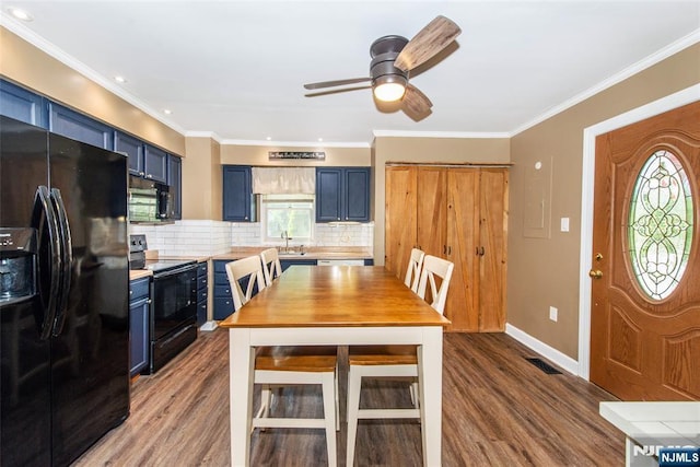 15 Mason St, Jefferson Township, NJ 07849 - dining room featuring healthy amount of natural light, wood finished floors, crown molding, ceiling fan, and recessed lighting