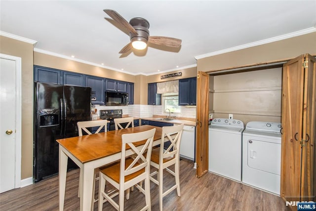 15 Mason St, Jefferson Township, NJ 07849 - kitchen with black appliances, blue cabinetry, washer and dryer, wood finished floors, and backsplash