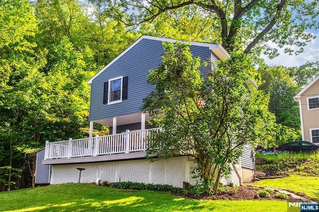 15 Mason St, Jefferson Township, NJ 07849 - back of property with a deck and a lawn