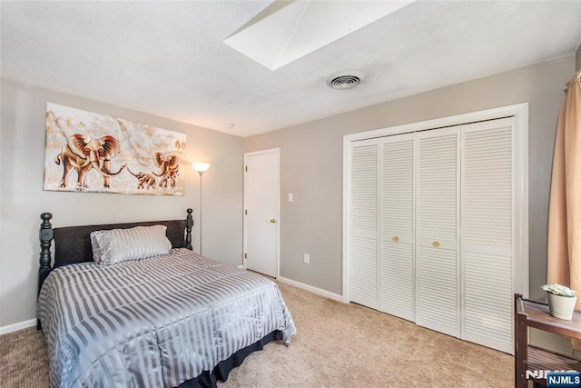 15 Mason St, Jefferson Township, NJ 07849 - bedroom with a skylight, light colored carpet, and a closet