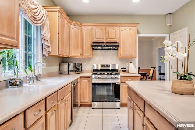 12 Jenny Ln, Wayne, NJ 07470 - kitchen featuring appliances with stainless steel finishes, light brown cabinetry, under cabinet range hood, recessed lighting, and light tile patterned floors