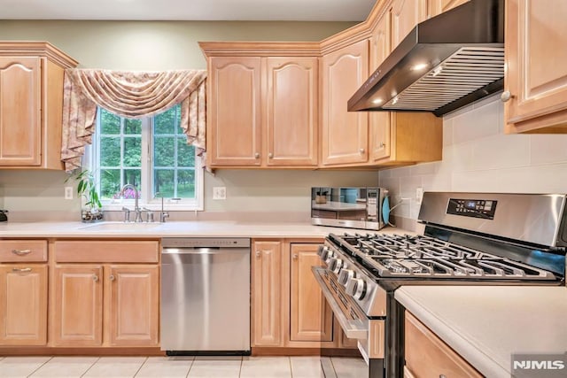 12 Jenny Ln, Wayne, NJ 07470 - kitchen with stainless steel appliances, ventilation hood, light brown cabinets, light countertops, and backsplash