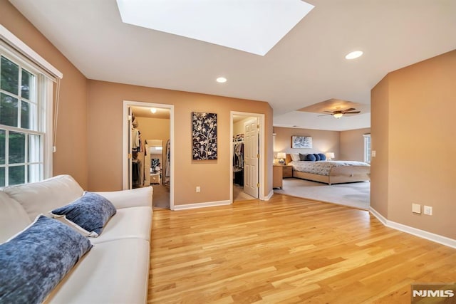 12 Jenny Ln, Wayne, NJ 07470 - living area with a skylight, light wood-style flooring, and recessed lighting