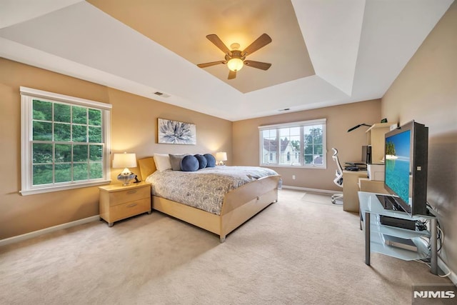 12 Jenny Ln, Wayne, NJ 07470 - carpeted bedroom with a raised ceiling and a ceiling fan