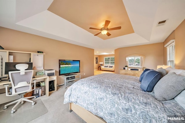 12 Jenny Ln, Wayne, NJ 07470 - bedroom featuring a tray ceiling, light colored carpet, and ceiling fan