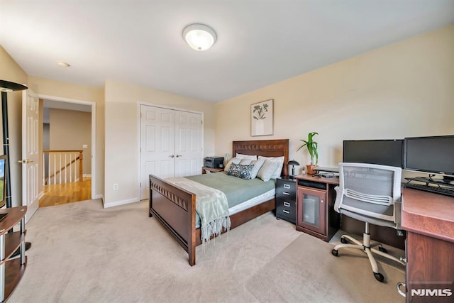 12 Jenny Ln, Wayne, NJ 07470 - bedroom with a desk, carpet, and a closet