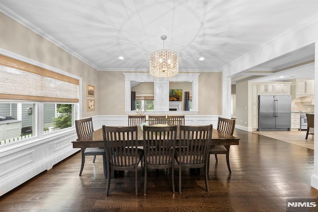 66 Andover Ter, Glen Rock, NJ 07452 - dining area with a chandelier, ornamental molding, recessed lighting, wood finished floors, and a wainscoted wall