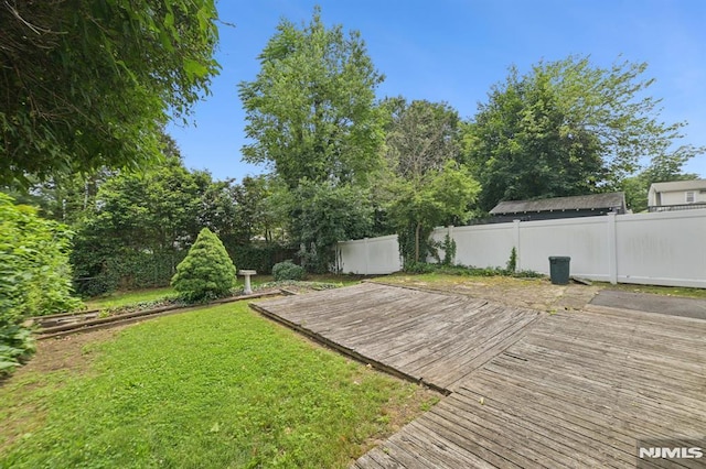 350 Walnut St, Nutley, NJ 07110 - fenced backyard with a deck