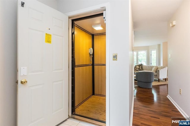 7 Di Donna Ct Unit A007, Clifton, NJ 07013 - corridor featuring elevator and light wood-style floors