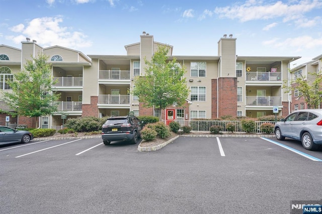 2112 Schindler Ln, Wayne, NJ 07470 - view of apartment building / complex featuring uncovered parking