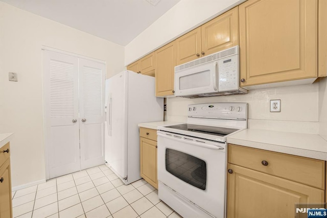 2112 Schindler Ln, Wayne, NJ 07470 - kitchen featuring white appliances, light countertops, and light tile patterned floors