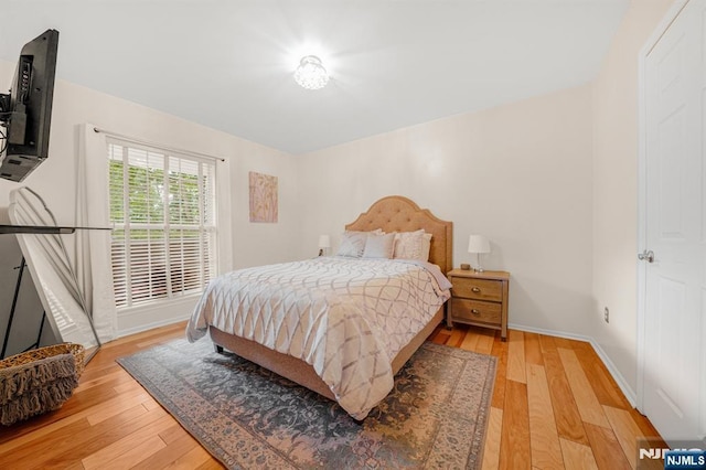 2112 Schindler Ln, Wayne, NJ 07470 - bedroom featuring light wood-type flooring and baseboards